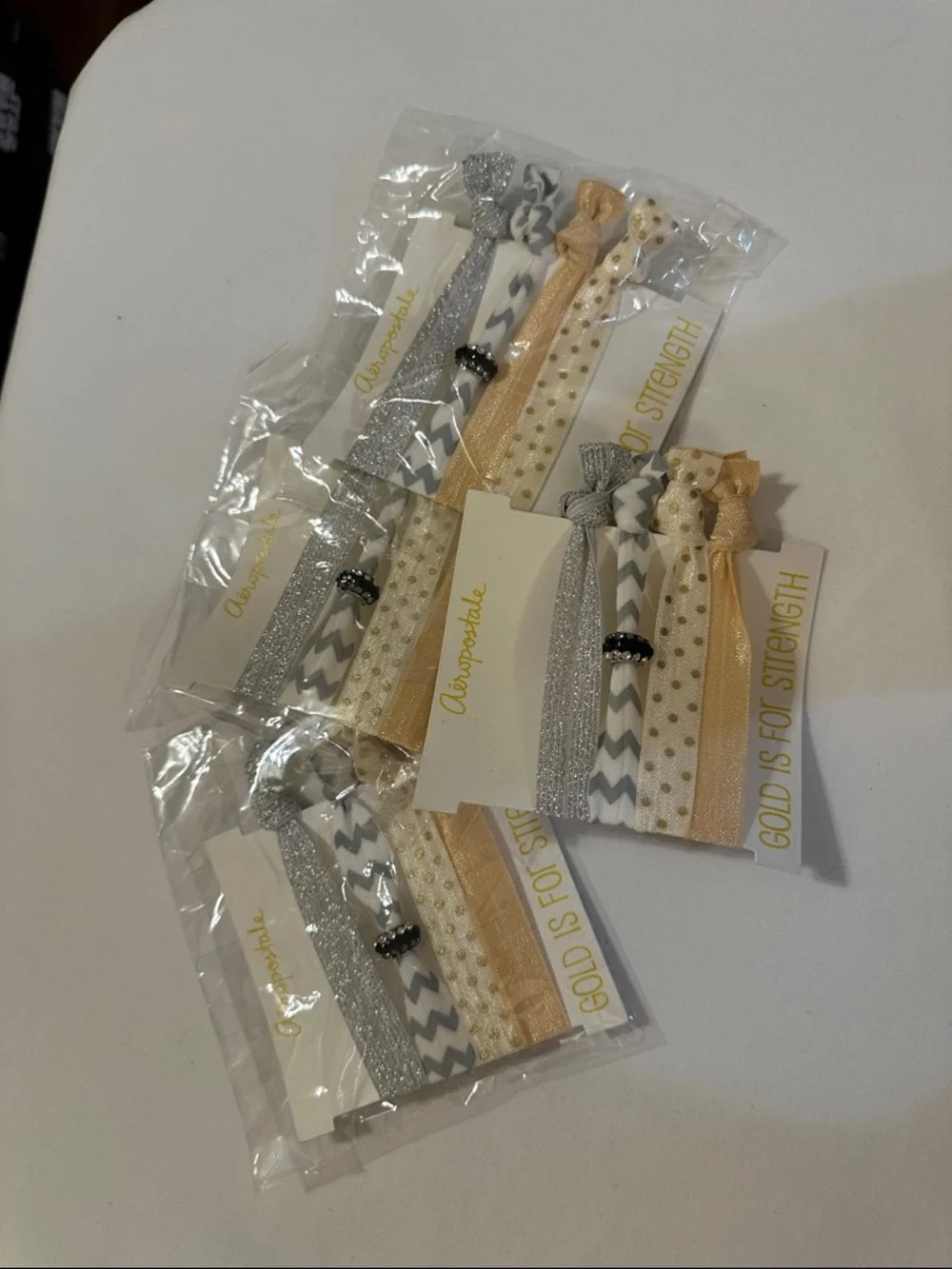 Aeropostale Gold, Silver, White & Gray Elastic Hair Tie Set